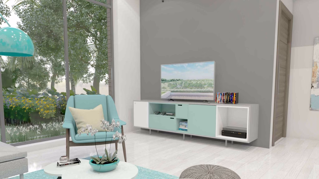 Modern living room at Oasis Harmony Villas with a large window, blue accent chair, white TV stand, television, books, and a coffee table topped with a potted orchid. Lush greenery and trees create serene views outside.