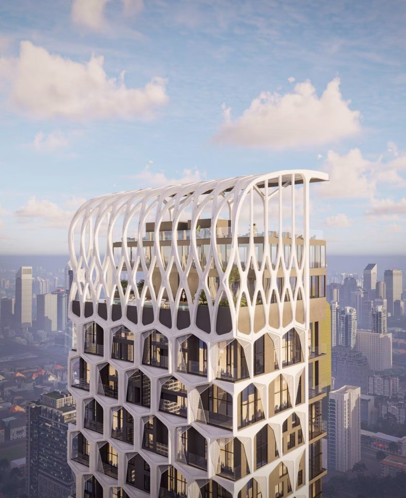 A modern high-rise building with a unique white geometric facade, featuring rounded vertical and hexagonal patterns, towers over a cityscape near Time Square 6, surrounded by other skyscrapers and a partly cloudy sky in the background.