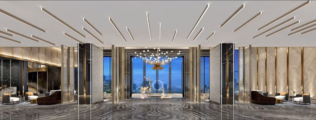 A luxurious hotel lobby with marble floors, modern seating areas, tall golden accents, a statement chandelier, and large windows offering stunning riverfront luxury and city skyline views.