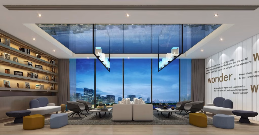 Modern lounge with floor-to-ceiling windows, city view, white sofas, colorful stools, and bookshelves on the left. Wonder text decor on the right and reflective ceiling panels add to the riverfront luxury ambiance.